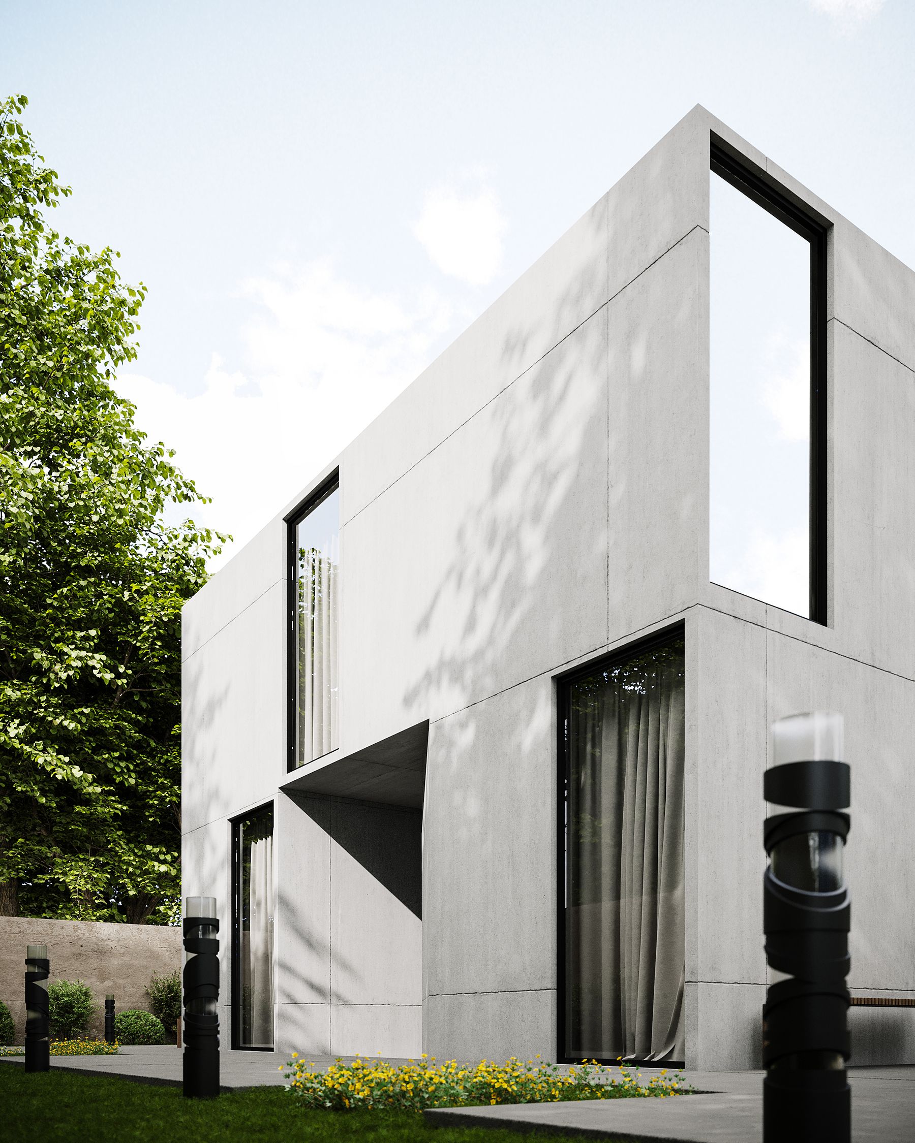 Casa contemporánea de hormigón blanco entre árboles